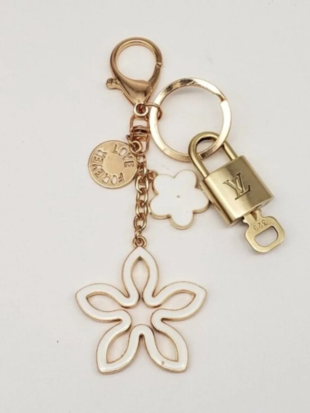 Authentic Louis Vuitton Gold Lock & Key 🔑 Bag Charm w/ Unbranded Clover Charm